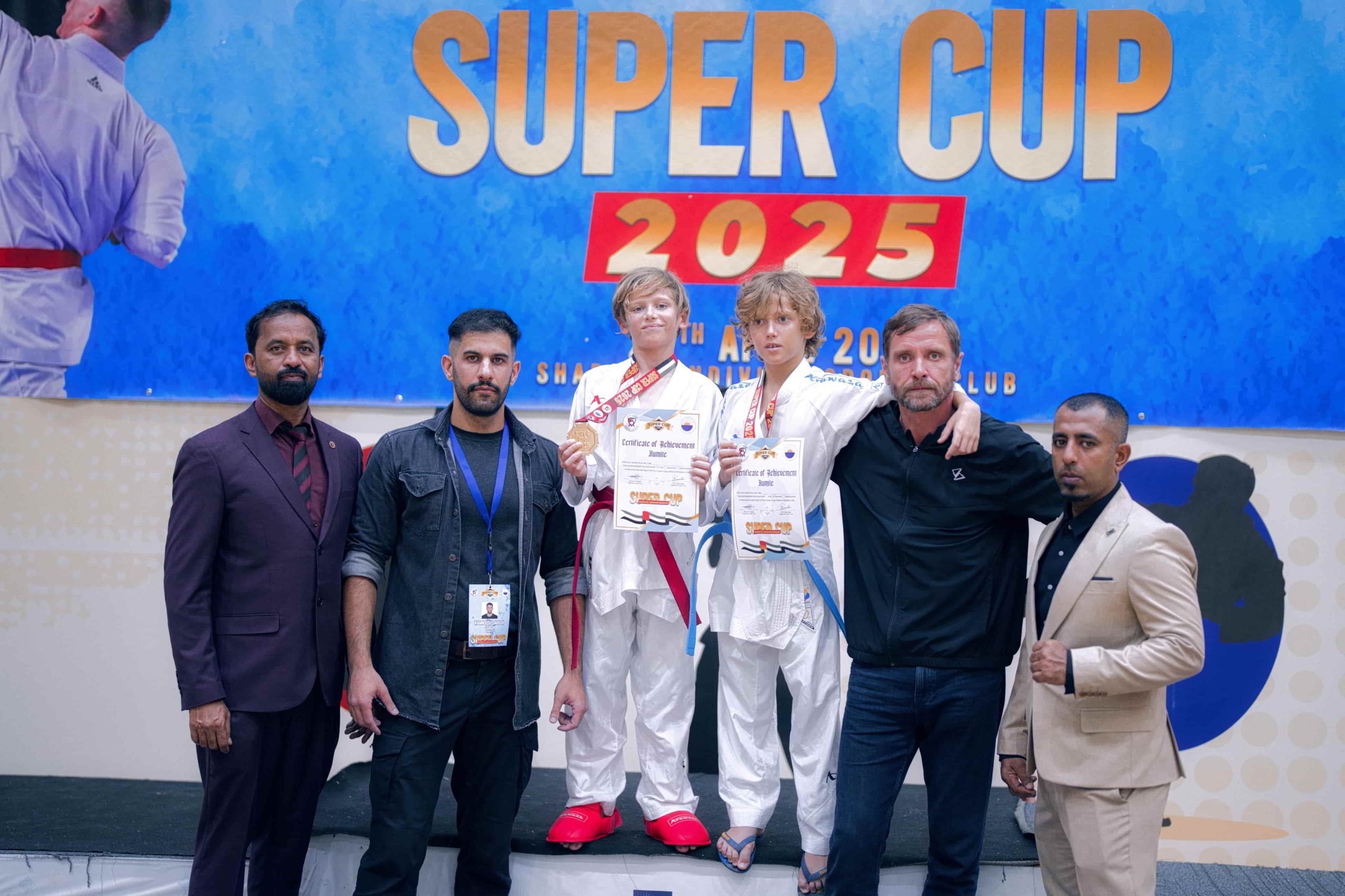 Oliver Petrikas in Champions Karate UAE competition Karate team group photo – Super Cup 2025 winners – SportPT